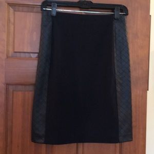 Black and imitation black leather pencil skirt.